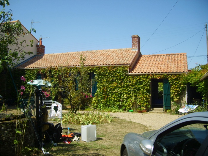 Surlvation d'une maison et construction d'un garage